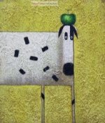 The abstract cow and a green apple on its head