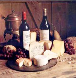 Two Bottle of Red Wine, several Bunches of Grapes, Some Bread and a Bonze Pot on the Table - Oil Painting Reproduction On Canvas